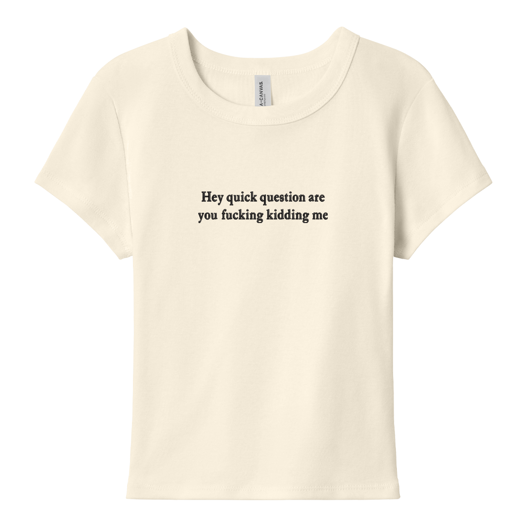 Natural baby tee with 'Hey quick question are you fucking kidding me' text on a white background
