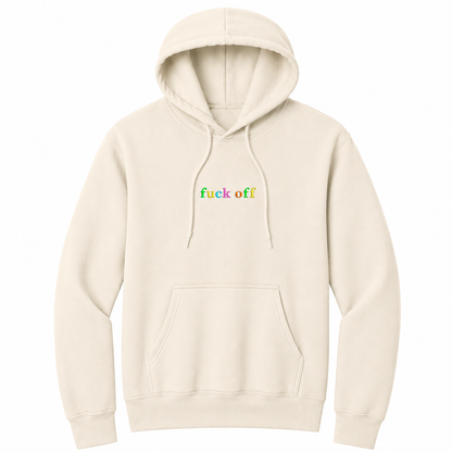 Front view of a natural pullover hoodie featuring the phrase "fuck off" in small lowercase letters across the chest. Each letter is embroidered in a different bright color, creating a subtle rainbow-inspired design with a clean, minimalist look. The drawstrings naturally drape over the graphic for a realistic product mockup. A bold adult hoodie with colorful typography, casual streetwear style, and sarcastic humor.