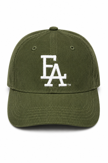 Olive corduroy baseball cap featuring a white embroidered “FLA” logo on the front, textured fabric, and a classic curved brim for a vintage-inspired streetwear look.