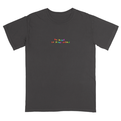 Dark grey t-shirt with 'be kind to your mind' text in colorful letters on a white background