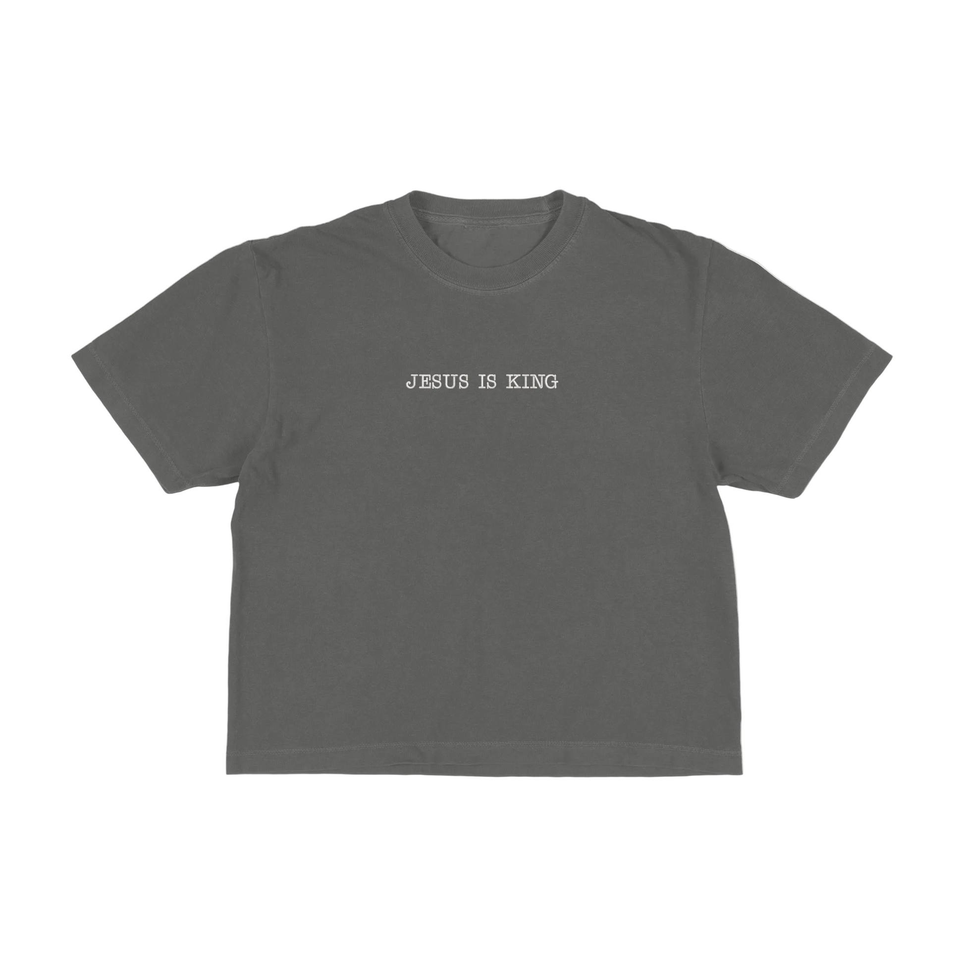 Dark gray boxy tee with 'Jesus Is King' text on a white background