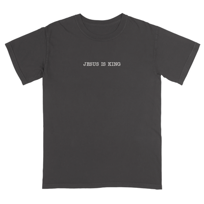 Dark gray t-shirt with 'Jesus Is King' text on a white background