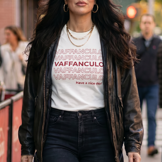 Woman wearing a “Vaffanculo – Have a Nice Day!” graphic t-shirt featuring bold Italian-inspired typography. Humorous Italian heritage shirt with a funny sarcastic saying, perfect for lovers of Italian culture, humor, family traditions, and classic Italian attitude.