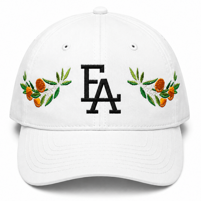 White baseball cap featuring a white embroidered “FLA” logo on the front, accented with colorful citrus and floral embroidery on both sides for a Florida-inspired design.