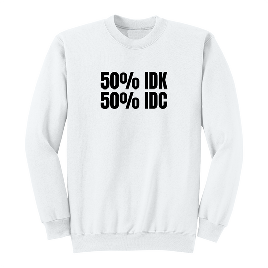 Front view of a white crewneck sweatshirt featuring the bold black phrase "50% IDK 50% IDC" printed across the chest. This minimalist funny graphic sweatshirt offers a clean, modern design with a classic fit, making it perfect for casual everyday wear or gifting to someone with a sarcastic sense of humor.