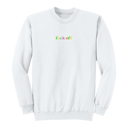 Front view of a white long sleeve crewneck featuring the phrase "fuck off" in small lowercase letters centered across the chest. Each letter is embroidered in a different bright color, creating a subtle rainbow-inspired design with a clean, minimalist aesthetic. A bold adult long sleeve shirt with colorful typography, casual streetwear style, and sarcastic humor.