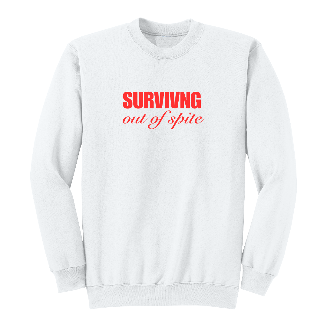 Front view of a white crewneck sweatshirt featuring the phrase "SURVIVING" in bold red block letters above the words "out of spite" in elegant red script centered on the chest. The clean, minimalist design stands out against the black fabric, creating a bold statement sweatshirt with a resilient and motivational aesthetic.