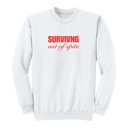 Front view of a white crewneck sweatshirt featuring the phrase "SURVIVING" in bold red block letters above the words "out of spite" in elegant red script centered on the chest. The clean, minimalist design stands out against the black fabric, creating a bold statement sweatshirt with a resilient and motivational aesthetic.
