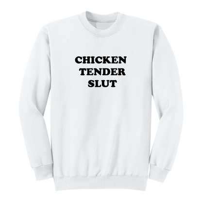 Front view of a white crewneck sweatshirt featuring the bold black stacked phrase "CHICKEN TENDER SLUT" in large retro bubble lettering centered on the chest. The simple vintage-inspired typography stands out against the black fabric, creating a humorous foodie-themed graphic sweatshirt with a clean, minimalist, and playful design.