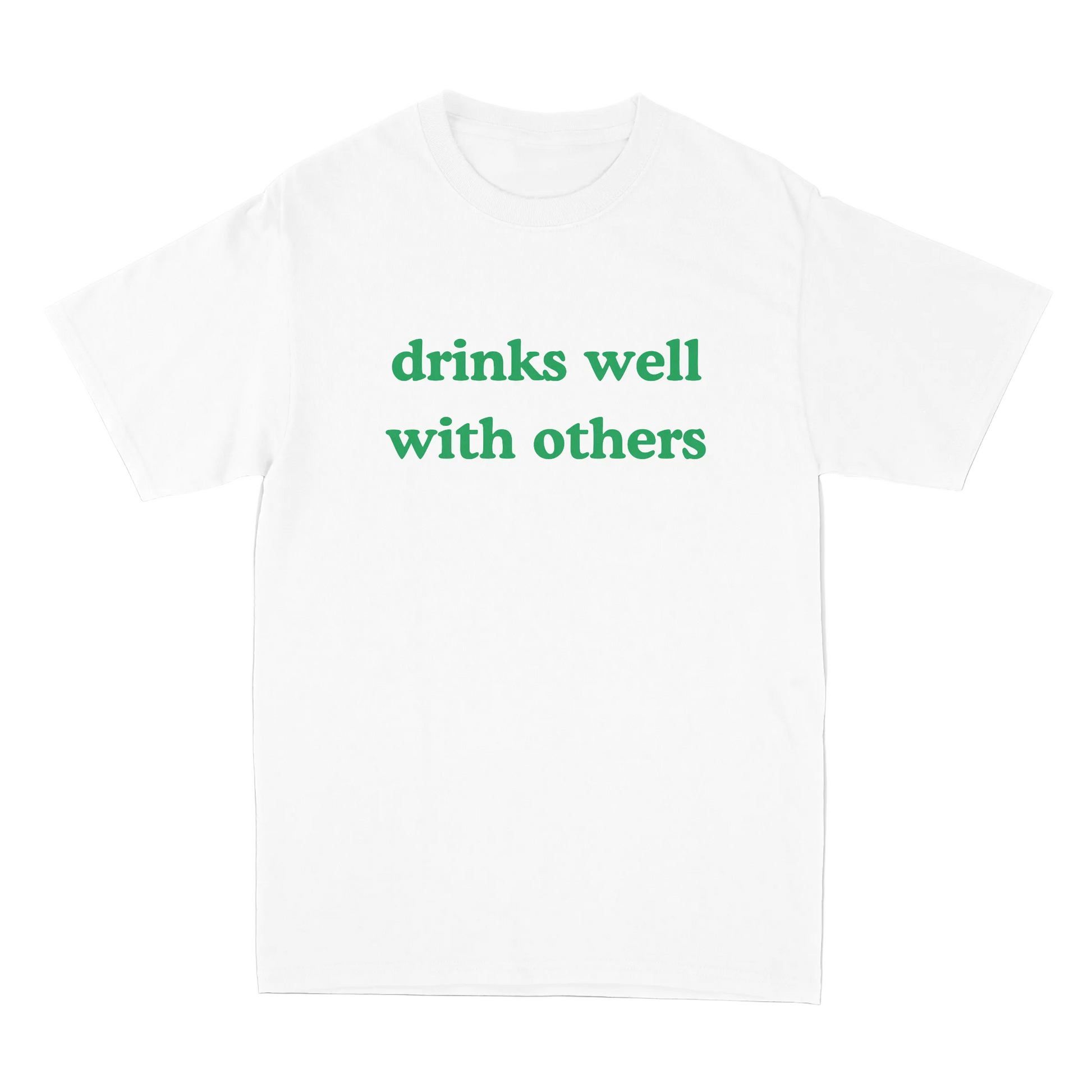 White t-shirt with green text 'drinks well with others' on a light gray background