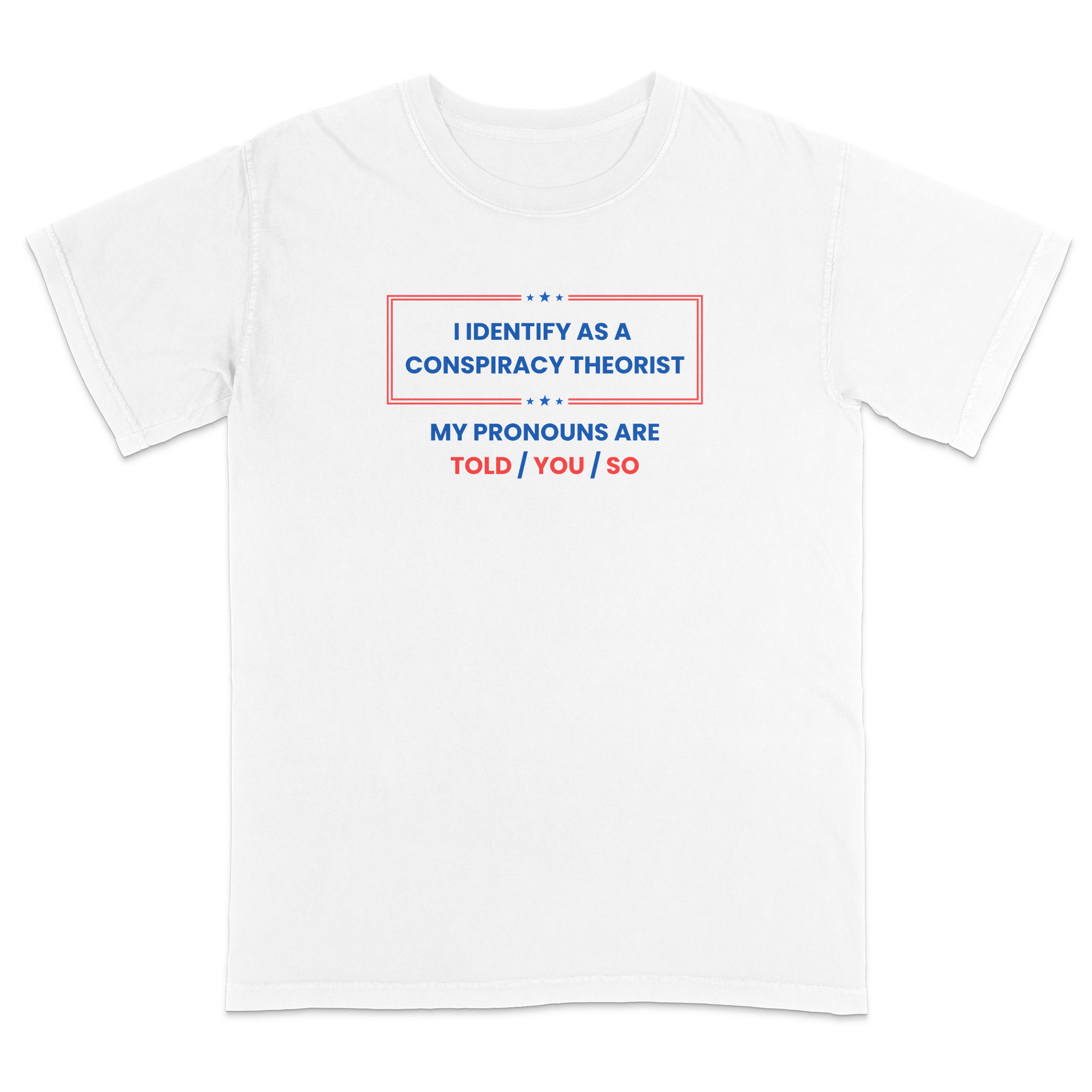 Front view of a white graphic T-shirt featuring the humorous phrase "I Identify as a Conspiracy Theorist" with "My Pronouns Are Told / You / So" printed below in bold patriotic red and blue lettering with stars and a bordered design. A funny political humor tee perfect for casual wear, parties, holidays, and anyone who enjoys satire and conspiracy-themed jokes.