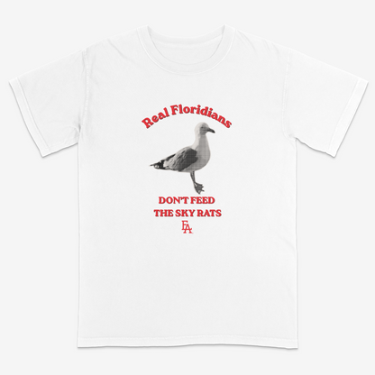White t-shirt with a graphic of a seagull and text on a white background