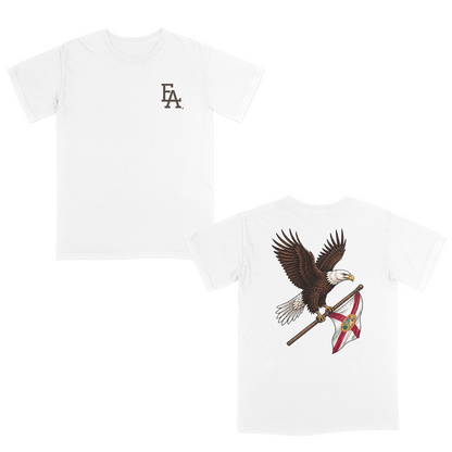 White patriotic t-shirt featuring a small FLA® logo on the left chest and a large back graphic of a soaring bald eagle carrying the Florida state flag. Florida-inspired apparel combining state pride, American heritage, and outdoor lifestyle style. Perfect for patriotic events, fishing trips, hunting, boating, beach days, and everyday Florida living.