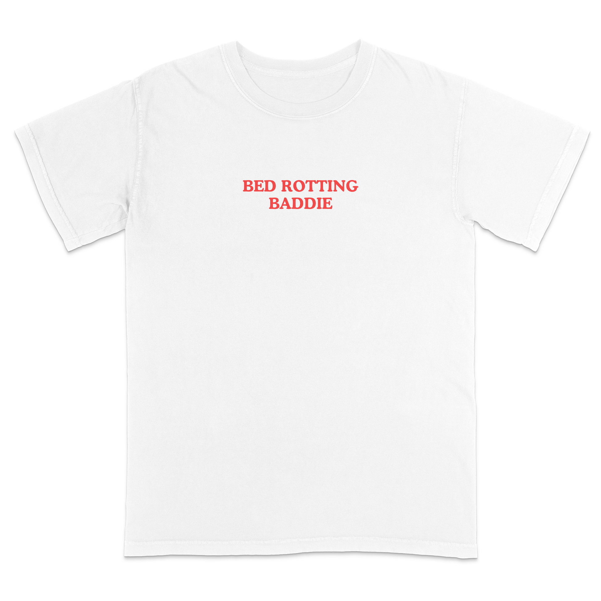 Front view of a white graphic T-shirt featuring the phrase "BED ROTTING BADDIE" in small vintage-style red lettering centered on the chest. This minimalist, trendy tee combines clean aesthetics with humorous Gen Z-inspired text for a casual everyday look.