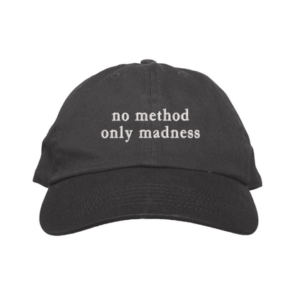 Black cap with 'no method only madness' text on a white background