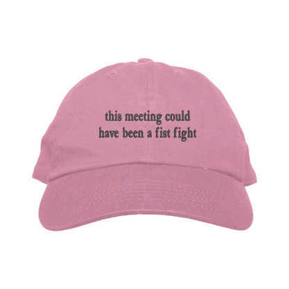Pink cap with text 'this meeting could have been a fist fight' on a white background